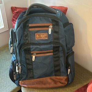 Penguin backpack with a 15” laptop pocket. Perfect for school or work.